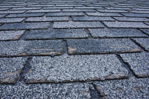 Weather-damaged shingle tile roof